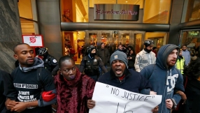 Protesters attack Christmas tree, venting fury in aftermath of 2014 police shooting of Chicago teen