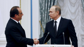 Putin agrees to form \'grand coalition\' with West to destroy ISIS after meeting French president in Moscow