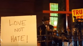 New York pastor shouts racist, anti-gay slurs at participants of \'Love Not Hate\' rally outside his church