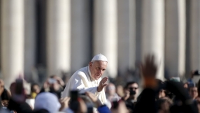 Pope gives red carpet treatment to homeless and refugees at Vatican premiere of biopic