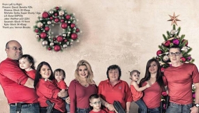 Nevada lawmaker champions right to bear arms with Facebook Christmas photo of her family all packing guns