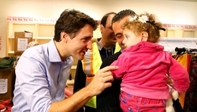 Canada\'s Trudeau tells first batch of Syrian refugees: \'You\'re safe and home now\'