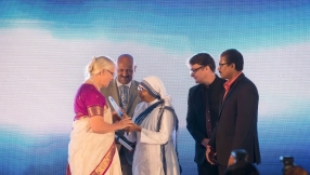 Widow of slain missionary receives Mother Teresa award