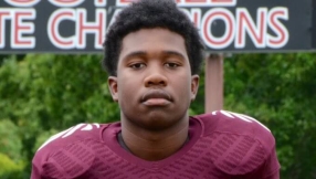 Football player, 15, is hailed as hero by President Obama after he shielded 3 girls with his own body during shooting