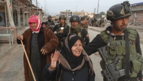 Terrified families emerge from ruins of liberated Ramadi   