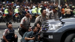 Jakarta attacks: Suicide bombers and gunmen kill at least six in Indonesian capital