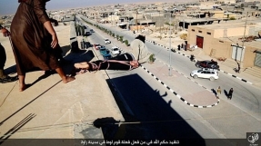 ISIS releases new photos of another man accused of being gay pushed off rooftop to his death