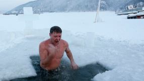 Russian Orthodox Christians take ice bath to mark Jesus\' baptism on Epiphany Day