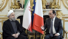 France: Iran clinches business deals worth billions as protesters march 