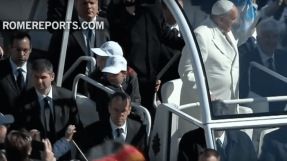 Pope gives two children the ride of their lives â in his Popemobile