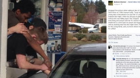 Photo of coffee shop employees praying with grieving customer goes viral 