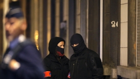 Belgian police arrest six in bombing probe, French foil Paris plot 