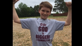 Christian parents print \'Our God is Bigger\' shirts to protest removal of Bible verse from school\'s website