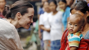 Christians being pushed out of their own church by Buddhist monks in Myanmar