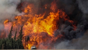 Canada wildfire: Evacuees gather to pray as fire rages on