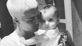 Justin Bieber breaks own fan photo ban as he posts photo of himself holding cute Armenian baby