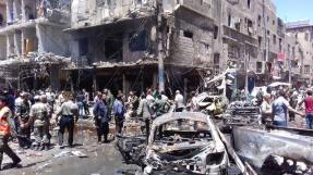 Islamic State claims bombings near Shi\'ite shrine in Damascus