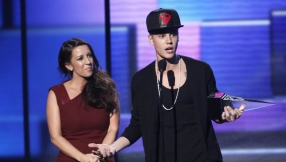 Justin Bieber\'s mom prays to Holy Spirit to enlighten her son as video appears to show him fighting during NBA Finals