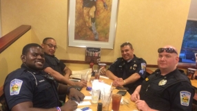 Surprising act of kindness: Police officer picks up tab of couple who refused to sit near law enforcers in U.S. restaurant