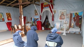 Catholic priest finds empty warehouses and donations drying up at Calais camp