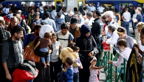 Christian refugees in Germany hiding their Bibles from Muslim extremists in migrant camps