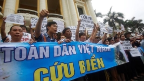 Police beat thousands of protesting Christian fisherfolk already suffering from mass fish deaths in Vietnam