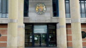 Solicitor and wife accused of swindling retired vicar out of Â£230,000