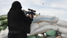 Mysterious Veiled Woman With A Pistol Strikes Fear In Heart of ISIS As She Goes On Killing Spree