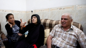 Elderly Christian Widow Forced By ISIS To Convert To Islam And Spit On A Crucifix