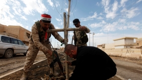 Christians Shed Tears of Joy as Cross, Symbol of Christ\'s Victory Over Evil, Is Back in Iraq